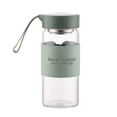 Bottiglia d' acqua in vetro borosilicato personalizzata da 480 ml con manica in pelle e infusore per tè