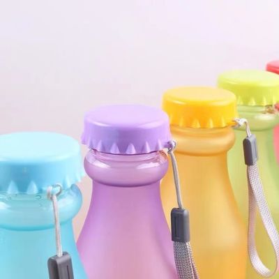 Bottiglia d'acqua senza BPA di 550 ml incrollabile in colori dolci per bambini scolastici 6.8x20 cm
