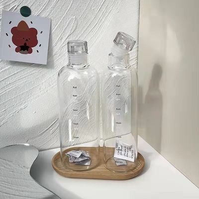 Stile di design minimalista 500 ml bottiglia d'acqua in vetro borosilicato senza BPA con marcatore dell'ora
